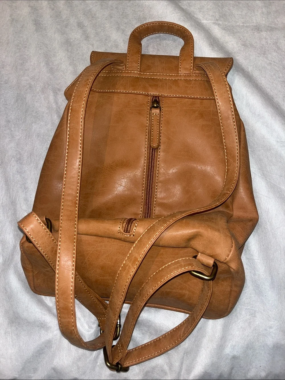 Braided Flap Tan Faux Leather Backpack with Tassel Accents